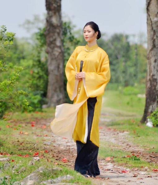 Vietnam classical Ao Dai in yellow dress and black pant
